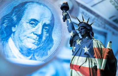 USA economy. Financial. Franklin's portrait next to statue of liberty. Statue of Liberty is painted in colors of the USA flag. Federal Reserve System of America. Concept - financial forecast for  USA
