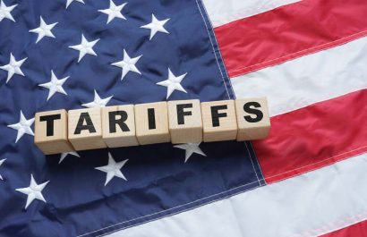 Import Trade Tariffs increase concept with United States of America Flag. Trade wars