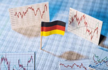 German flag with rate tables and graphs for economic development.